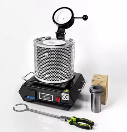 Compact Portable Electronic Melting Furnace for the melting of gold and silver, designed for jewelry-making applications.